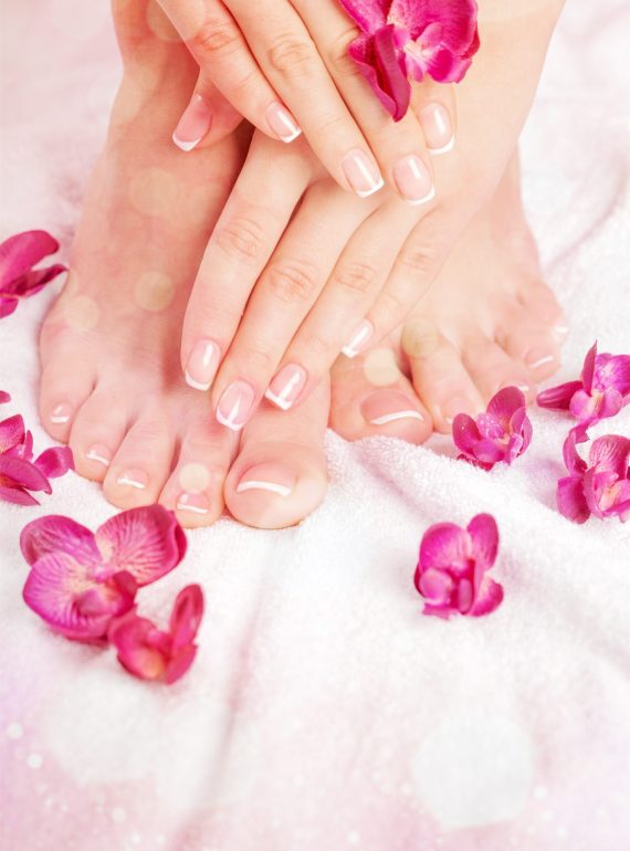 Perfect hands on female feet